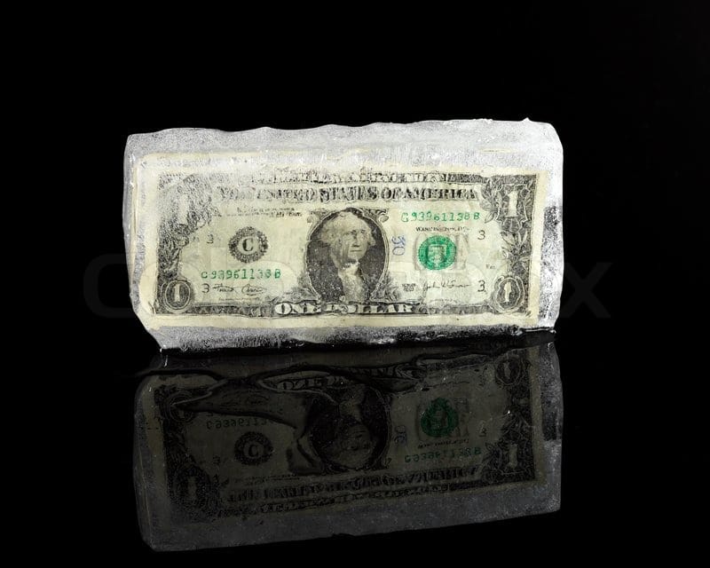 1023719-frozen-american-dollar-bill-in-black-background