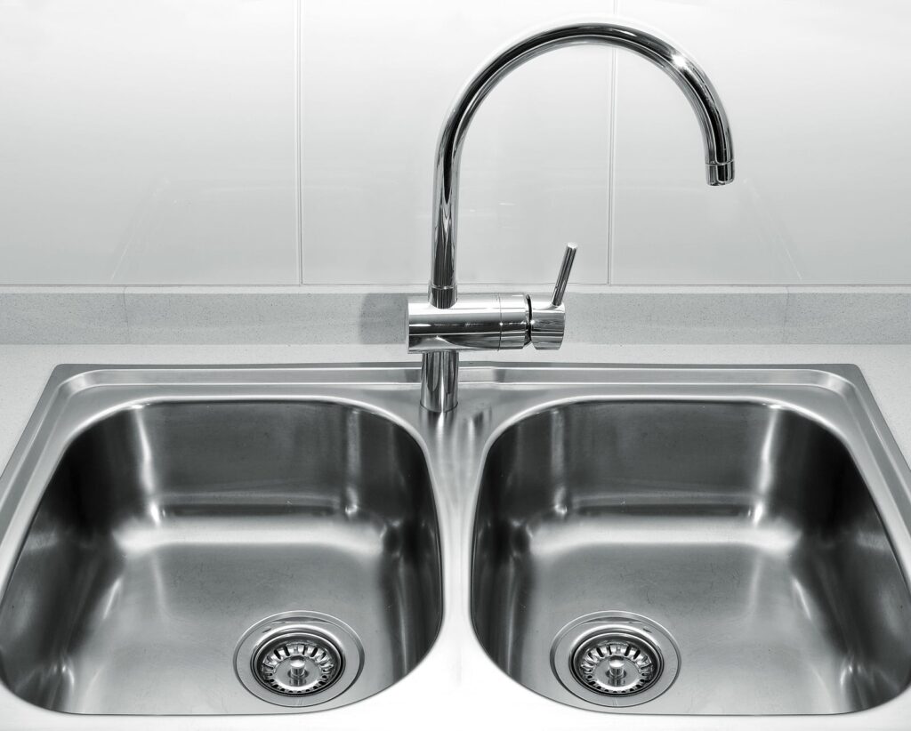 Why is My Double Kitchen Sink Backing Up to the Other Side?